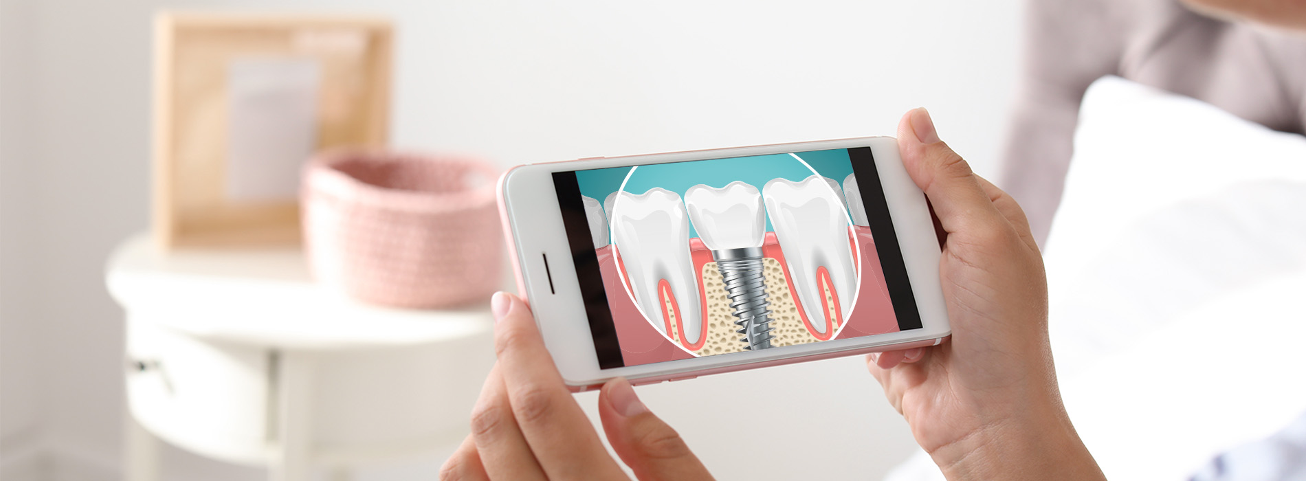 A person holding a smartphone displaying a graphic of a toothbrush with bristles.